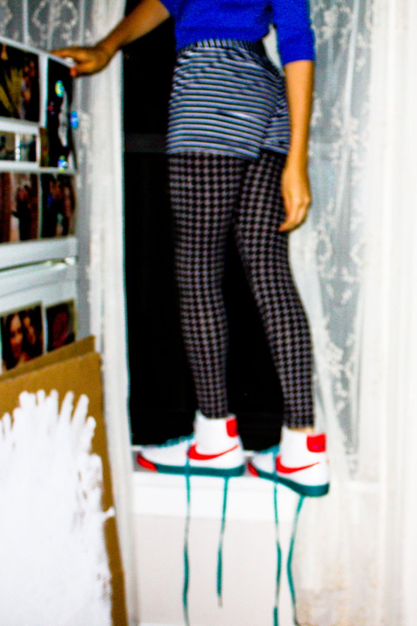 nikes on a window sill